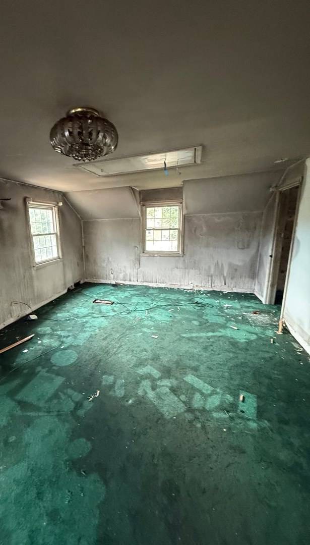 Attic bedroom coated in soot